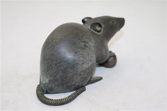A Japanese bronze model of a rat holding a nut, late 19th century, length 17cm, loss to tail